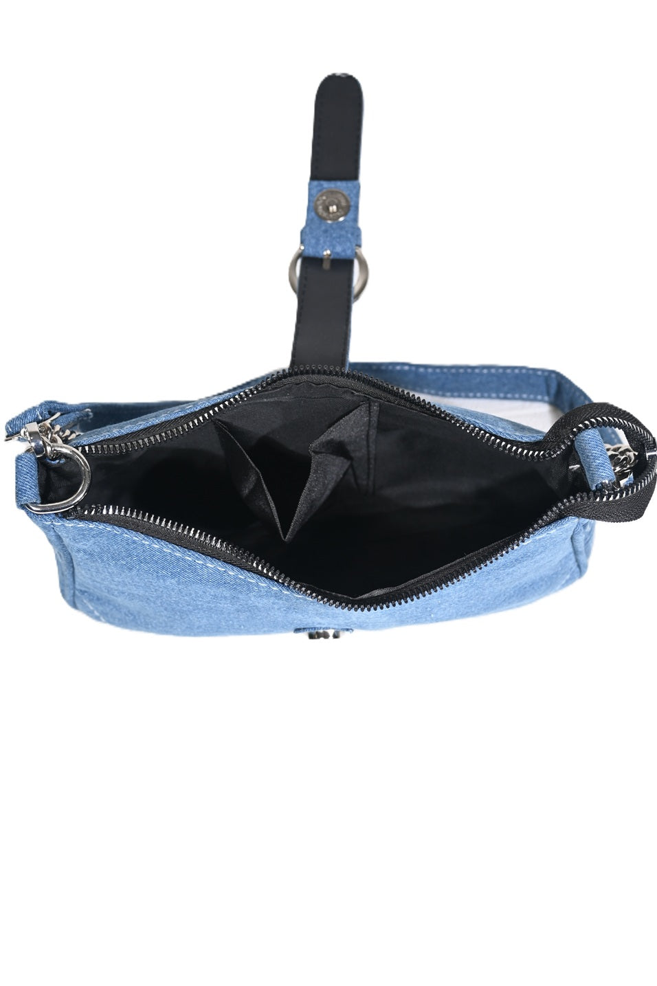 Open blue denim handbag with black zipper and interior pockets, top view