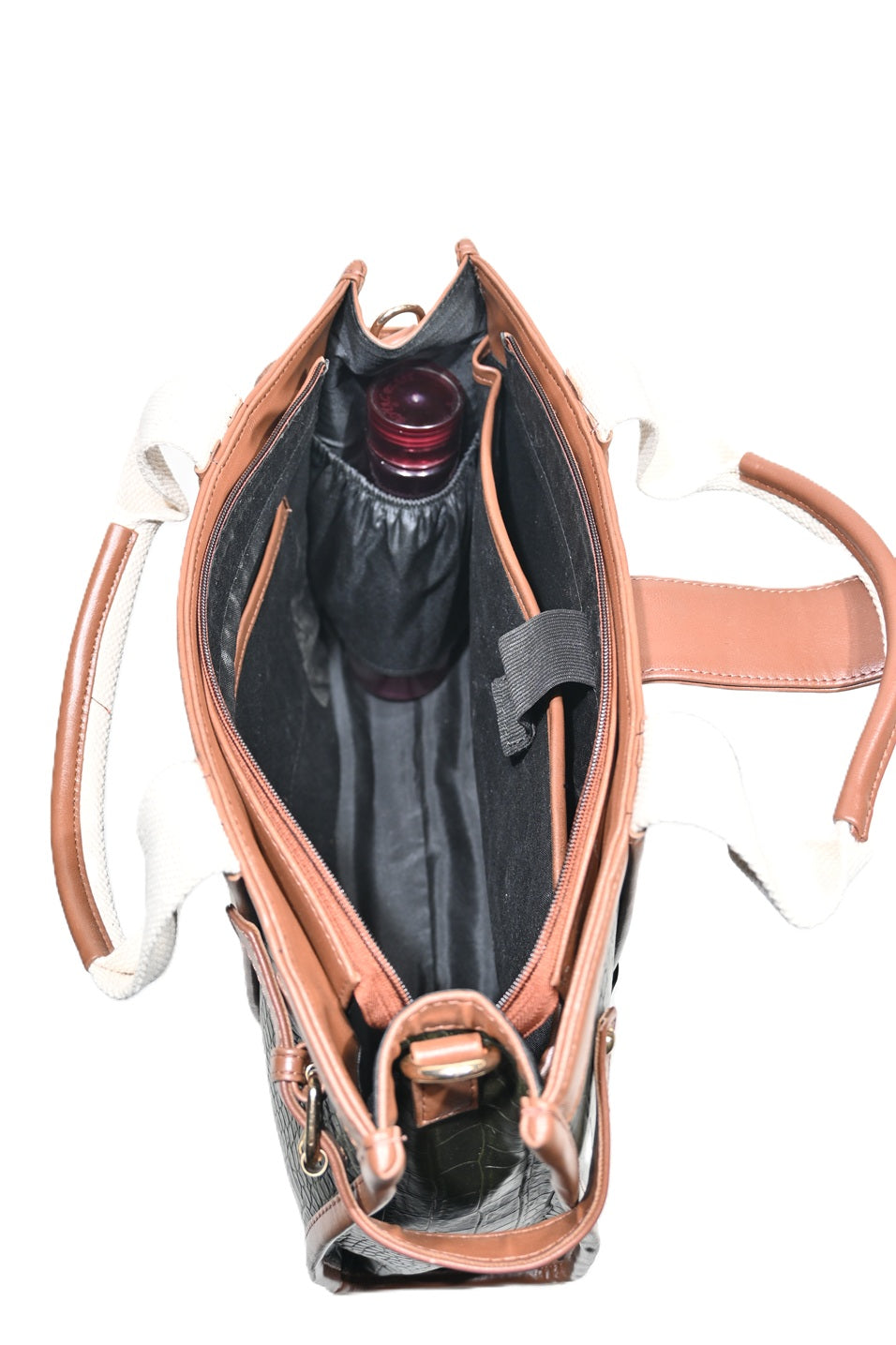 Top view of spacious brown leather handbag with interior pockets and water bottle compartment