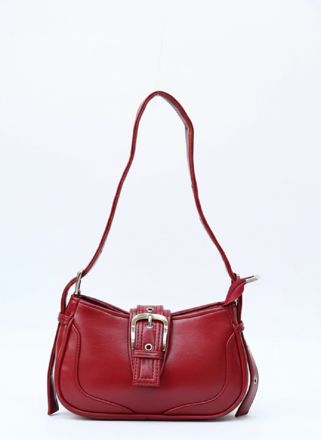 Red leather shoulder bag with silver buckle detail, elegant purse on white background