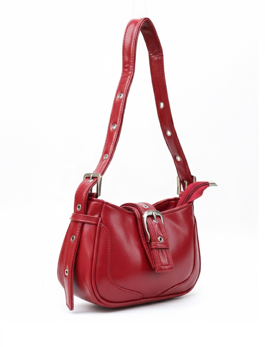 Red leather handbag with silver buckle and adjustable strap, stylish accessory on white background
