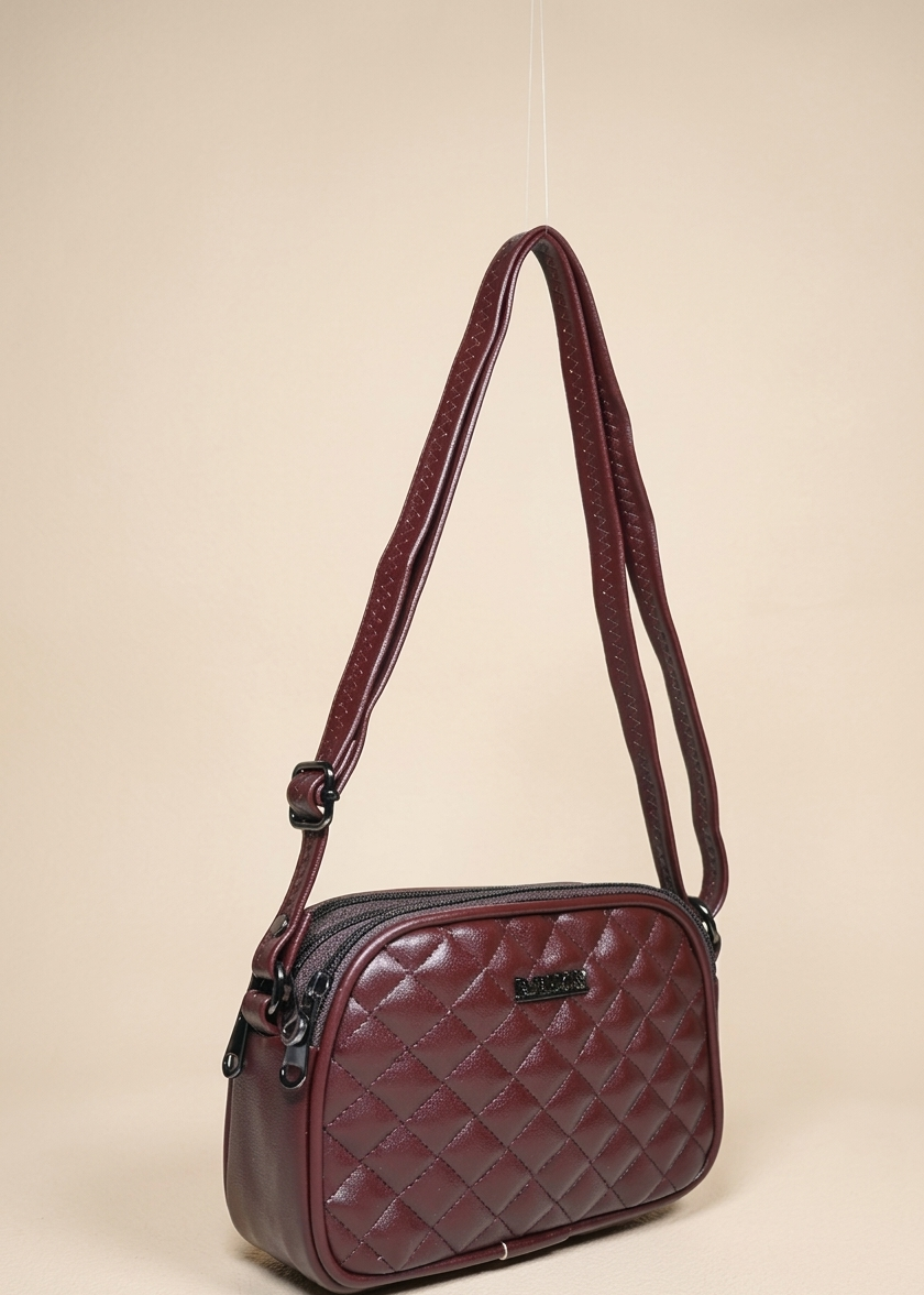 Brown quilted women sling bag