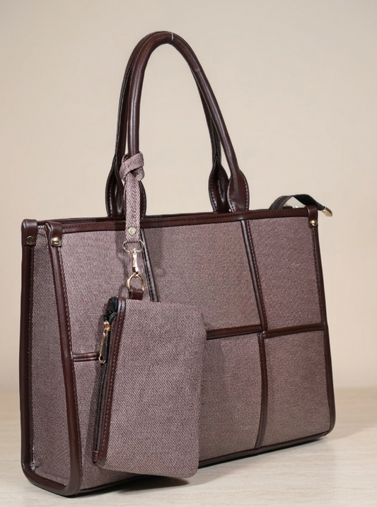 Elegant brown leather-trimmed handbag with matching pouch, modern grid design