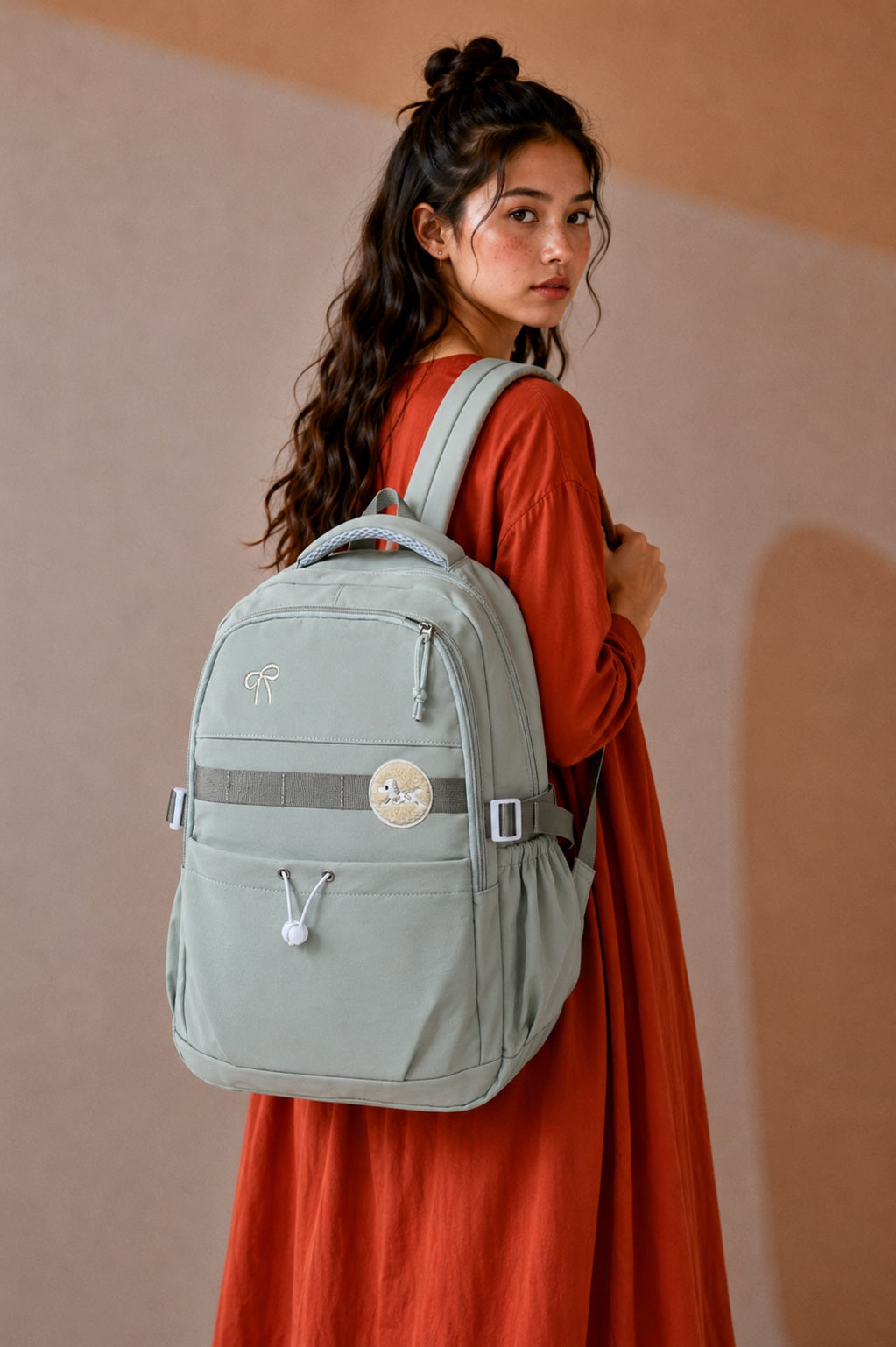 Graceful Bow Accent Multi-Pocket Backpack.